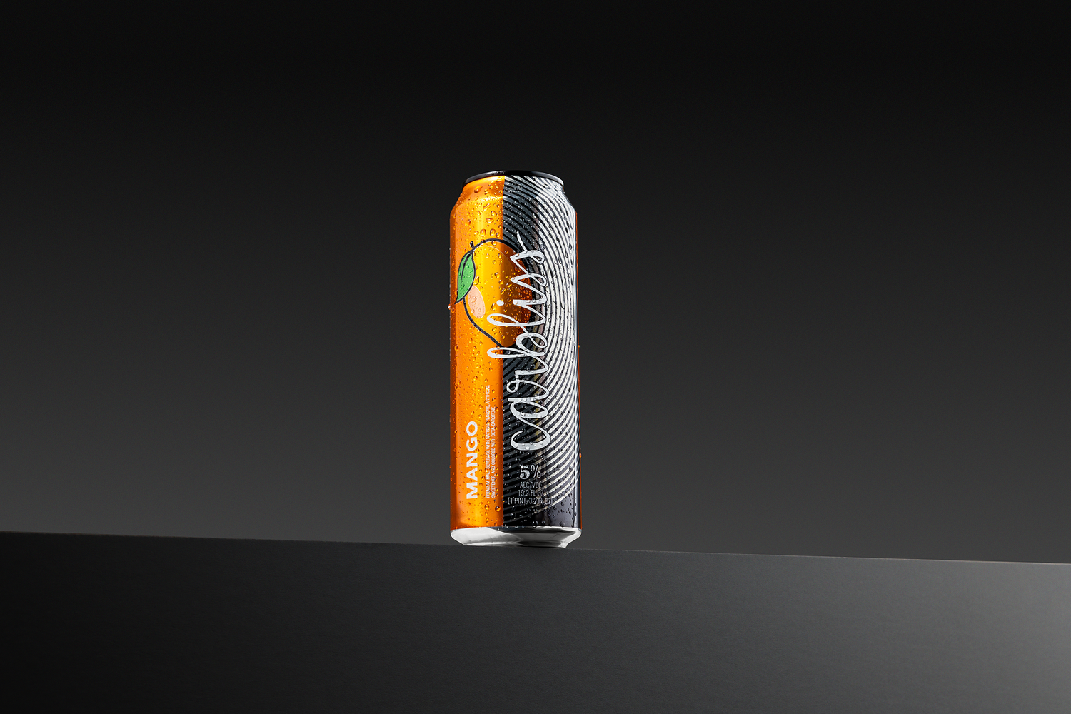 Carbliss Cocktails Mango can on a dark background